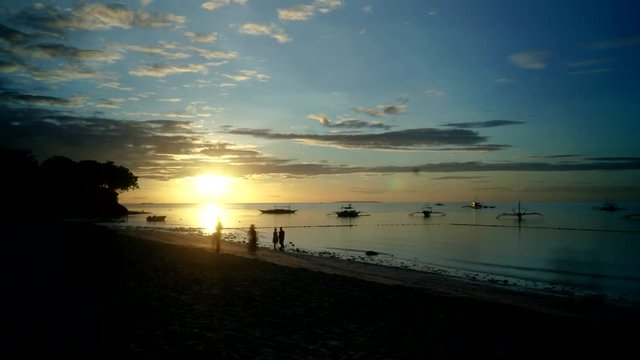 Sunrise time lapse at Alona Beach, in Bohol, Philippines.
