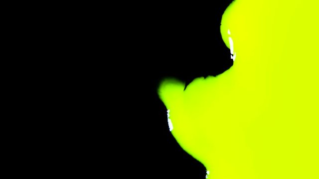 Yellow Paint Absorbs the Black Background. Streaks of yellow paint gradually close chery screen. Excellent for inter-frame transition