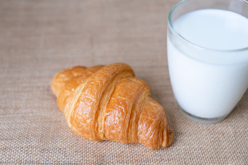 Croissants and milk on table.  Food for breakfast concept