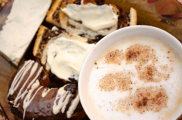 Hot coffee with cinnamon, milk. Sweet, dessert, breakfast