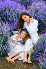 girls are in the lavender flower field, beautiful summer landscape