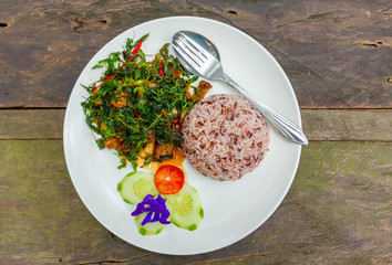 fried pork with fried basil and brown rice