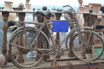 Naklejka na ściany i meble Vintage bike with a sign