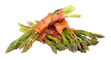 Grilled asparagus wrapped in smoked streaky bacon rashers isolated on a white background