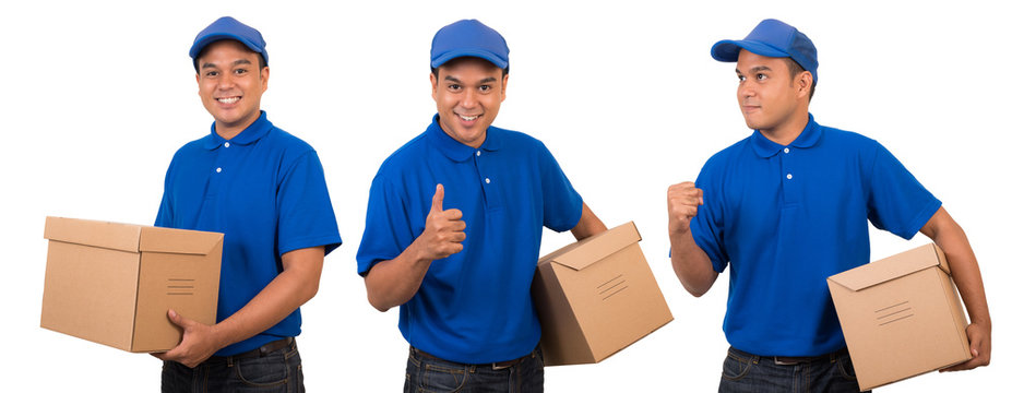 Young Asian Delivery Man In Blue Uniform With Parcel Cardboard Box On Isolated