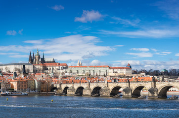The Prague castle with historic Charles Bridge and Vltava river under blue sky. Prague is a popular travel destination. Prague, Czech Republic