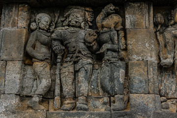 A fragment of the Borobudur Temple wall engravings, Yogyakarta, Central Java, Indonesia