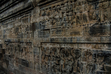 A fragment of the Borobudur Temple wall engravings, Yogyakarta, Indonesia