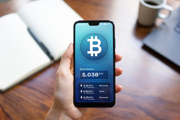 Bitcoin wallet interface on smartphone screen. Cryptocurrency payments and blockchain technology...