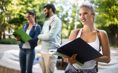 Obraz premium Group of friends studying together at university campus