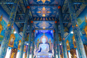 The white buddha statue inside the Hall in Blue temple (Wat Rong Suea Ten) in Chiangrai. - obrazy, fototapety, plakaty