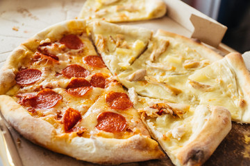 slices of pizza with different toppings in cartoon box lifestyle
