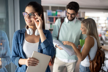 Group of friends studying together at university campus