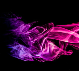Colored smoke on black background