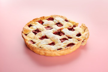 Tasty strawberry pie on color background