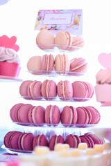 Delicious pink macaroons on stander