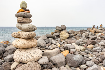 Many beautiful Cairns along the coast of Costa Adeje on Tenerife, Spain