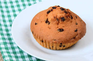 Fototapeta na wymiar fresh tasty homemade muffins on white plate