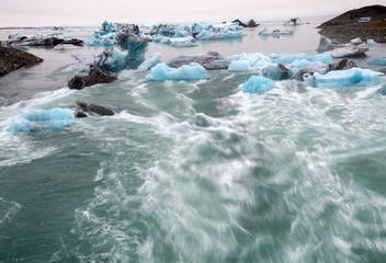 Icebergs in Jokulsarlon beautiful glacial lagoon in Iceland. Jokulsarlon is a famous travel destination in Vatnajokull National Park,  Iceland,