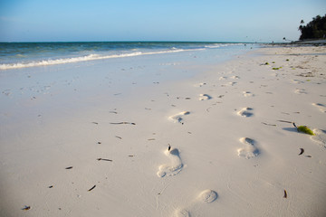 Footprints in the white sand,Paje beach,Zanzibar