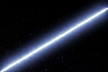 Abstract ray light in space.Line beam effect with texture background