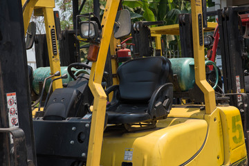 Forklifts in warehouse