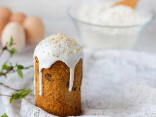 Holidays breakfast concept with copy space. Easter orthodox sweet bread, kulich on a white background. Copy space.