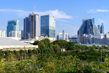 Fototapeta premium aerial view Bangkok city urban downtown skyline modern office buildings and condominium tower on blue sky background , City scape Bangkok City Thailand