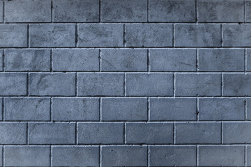 Background of smoothly laid cinder blocks. Wall of bricks.