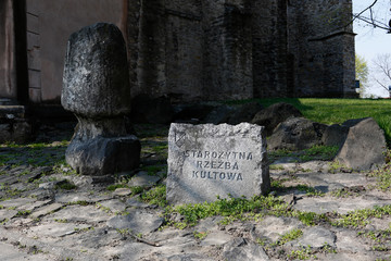Stone with an inscription in Polish: Ancient iconic sculpture near the Church of the Holy Apostle...