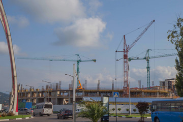 Fototapeta na wymiar Crane and building construction. big building construction