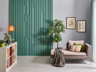 Modern decorative living room with sofa and frame decoration.