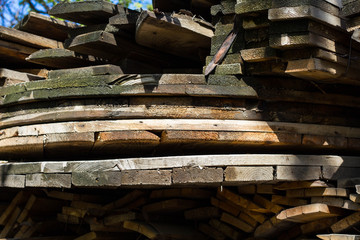 Stack of old firewood texture background. Firewood for the winter, stacks of firewood, pile of firewood. 