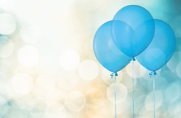 Bunch of colorful balloons on bokeh background