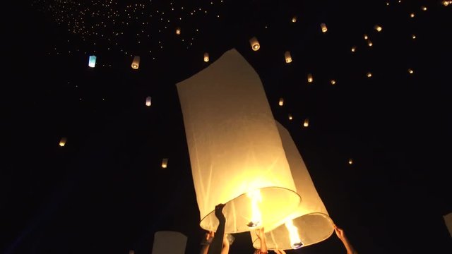 Releasing lanterns in Thailand loi krathong festival night