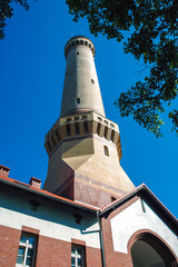 Obraz premium View on a tower of Baltic Sea lighthouse in Swinoujscie city, Poland