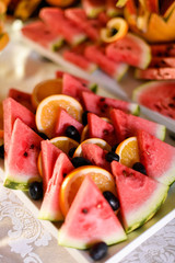 Fruits bar with bananas, watermelon, peach and other fruits