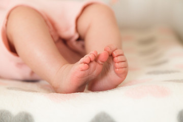 Closeup photo of a tiny baby feet
