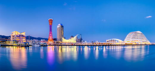 Port of Kobe skyline at night in Kansai, Japan - Panoramic view - obrazy, fototapety, plakaty