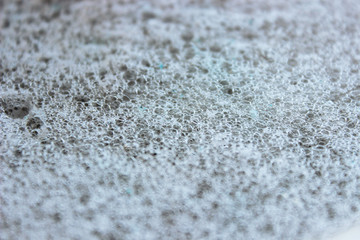 Abstract background of soap bubbles. Small bubbles. Micro photography, beautiful patterns. Amazing texture. Space