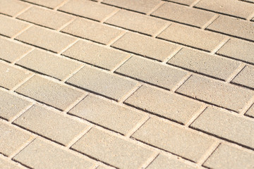 Brick path view of train station pathway.