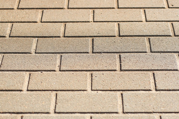 Brick path view of train station pathway.