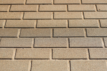 Brick path view of train station pathway.