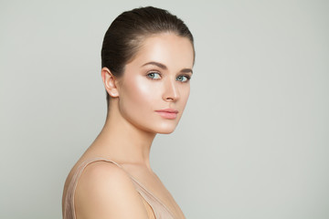 Beautiful healthy woman with clear skin. Natural beauty, skincare and facial treatment