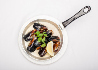 Dish from mussels on a white background