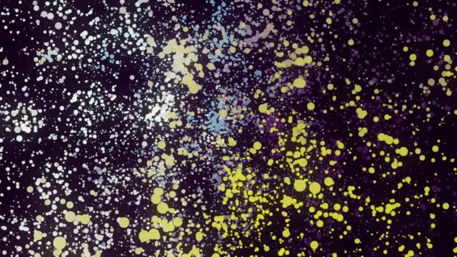Abstraction of colorful particles rotation on a dark background. Footage. Colorful animation