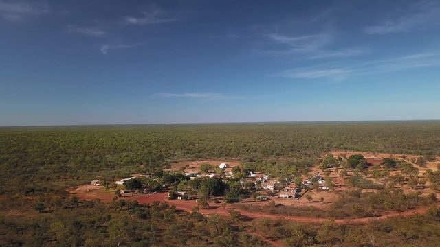 Wide panning drone shot of the quiet sleepy town of Daly Waters in Australia's outback, Northern Territory.