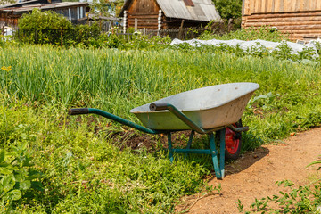 cart for carrying cargo in the garden, Tool for gardening and home farming