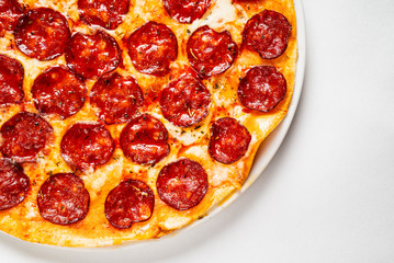 Hot Homemade Pepperoni Pizza on the white background