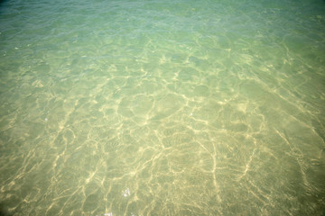 Small waves lapped the beach